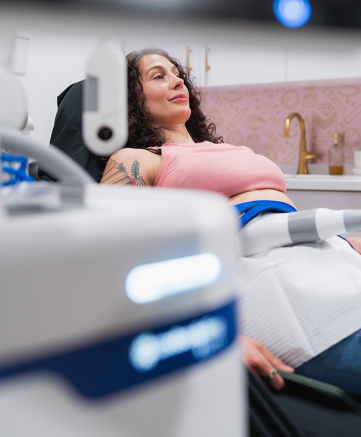 Client enjoying a beauty treatment at salon.
