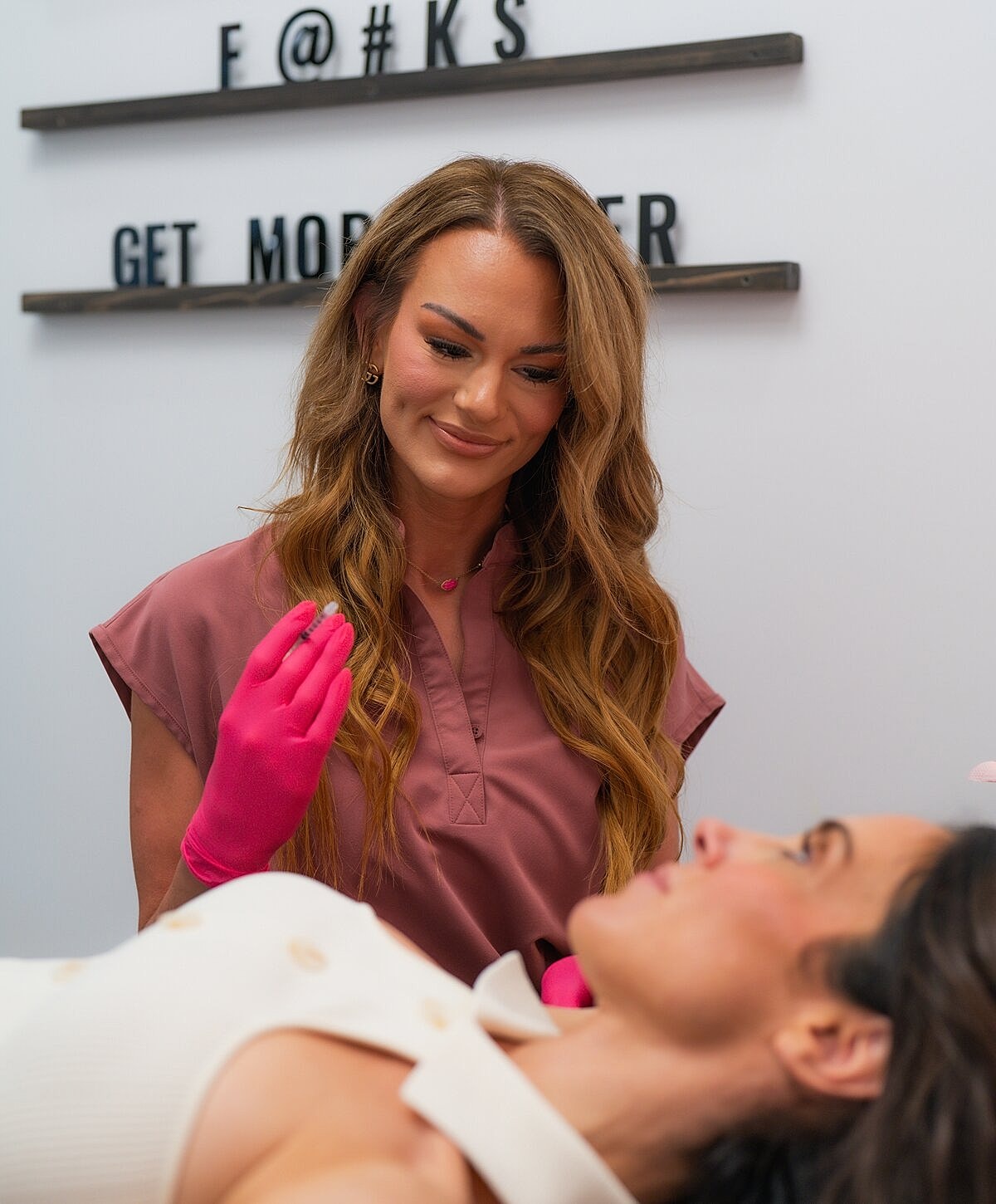 Client enjoying a beauty treatment at salon.