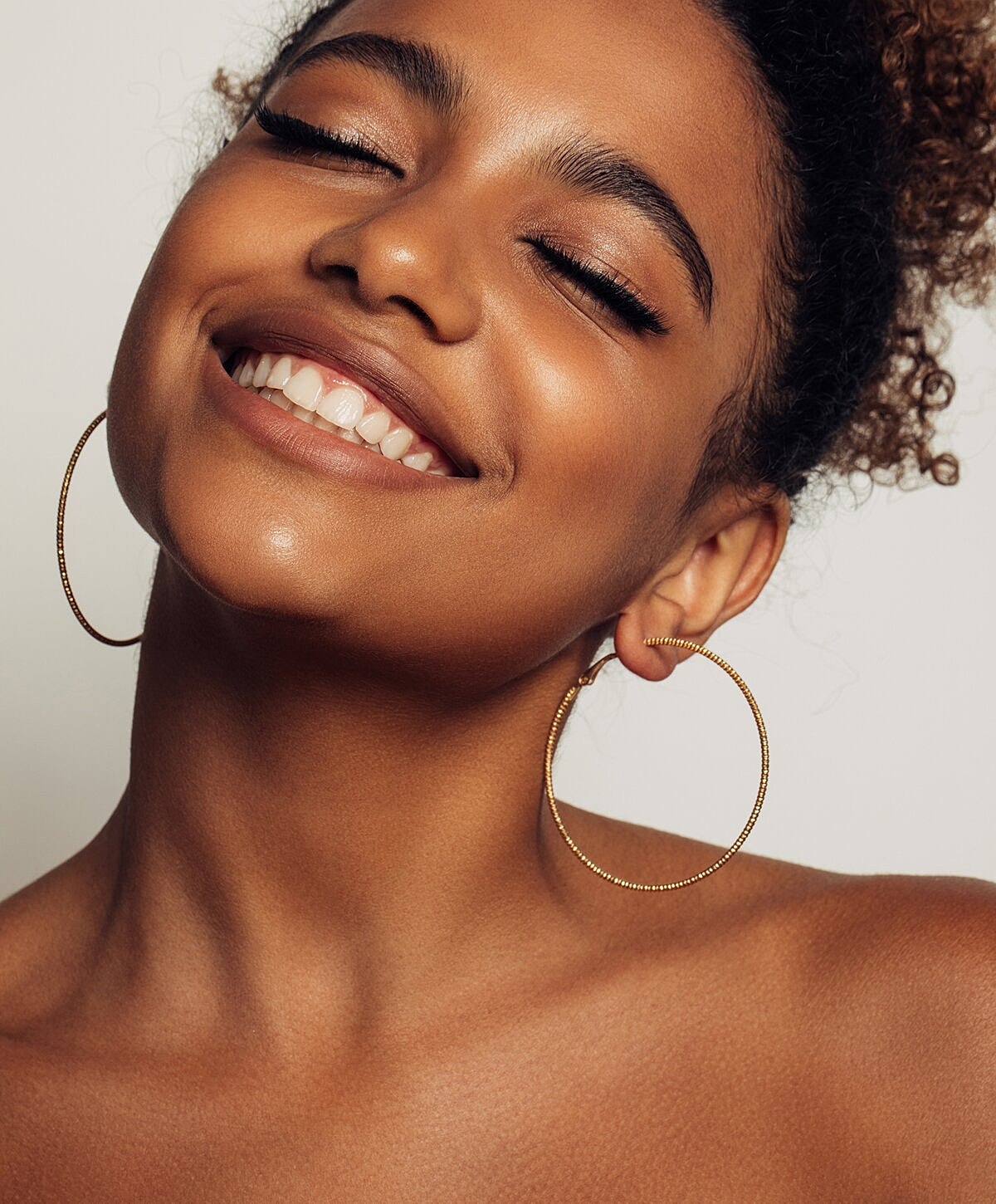 Client enjoying a beauty treatment at salon.