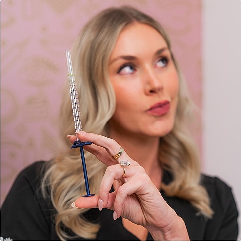 Close-up of lips about to kiss.